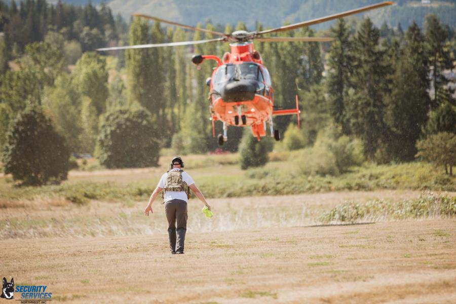 coast guard helicopter landing at unity of effort