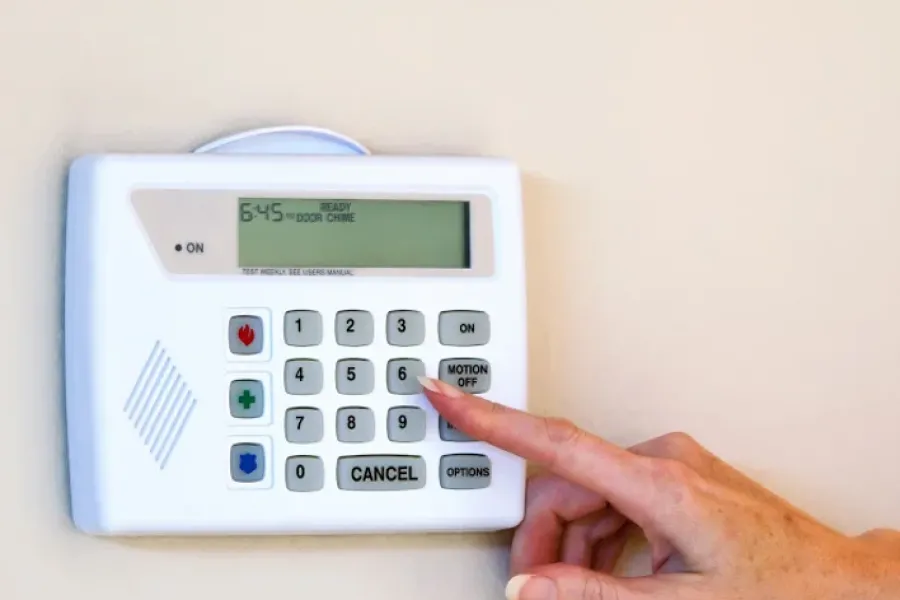 right hand pushing button on alarm system panel