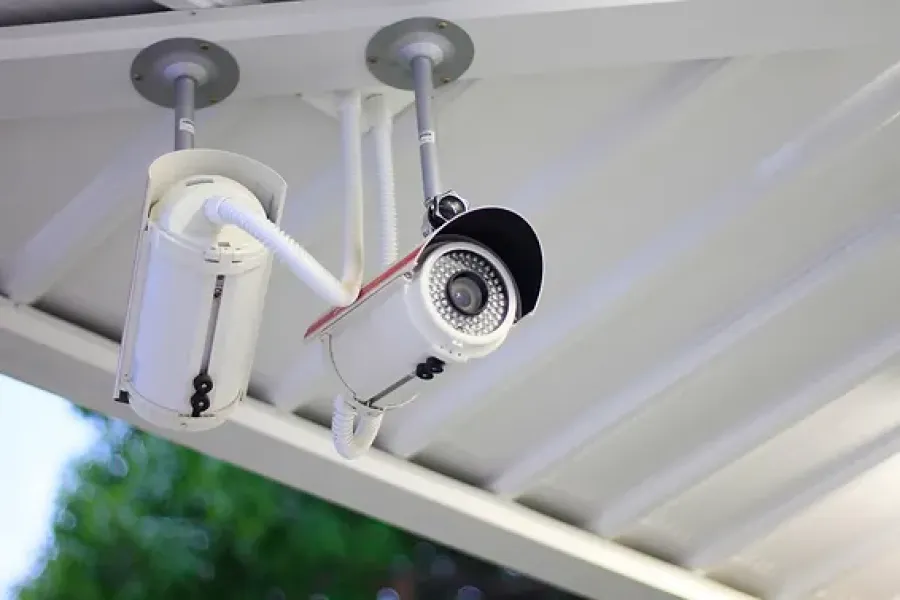 cctv security camera mounted on porch