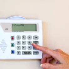 right hand pushing button on alarm system panel