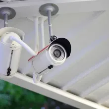 cctv security camera mounted on porch