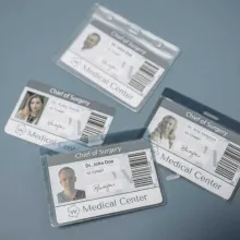 four id badges for doctors at a medical center