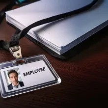 close up of employee id badge lanyard on desk