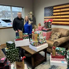 d'amicos with presents to donate