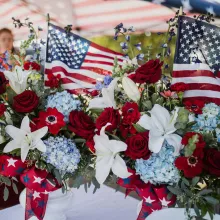 unity of effort table decorations flags and flowers