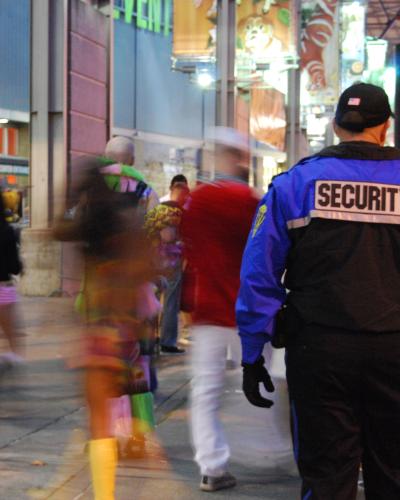 two security guards facing away