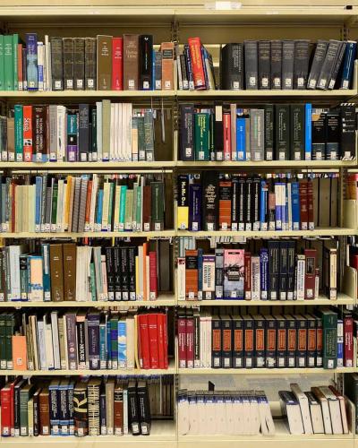 rows of books on library shelves