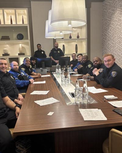 group of officers sitting around table