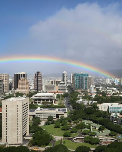 cityview of honolulu hawaii with rainbow