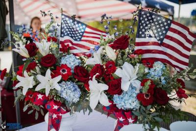 unity of effort table decorations flags and flowers